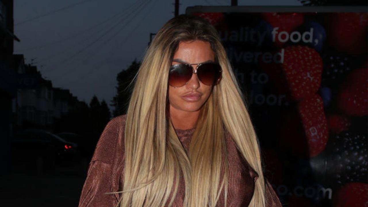 Katie Price shows off her huge boobs as she enjoys a girls' night out after  split